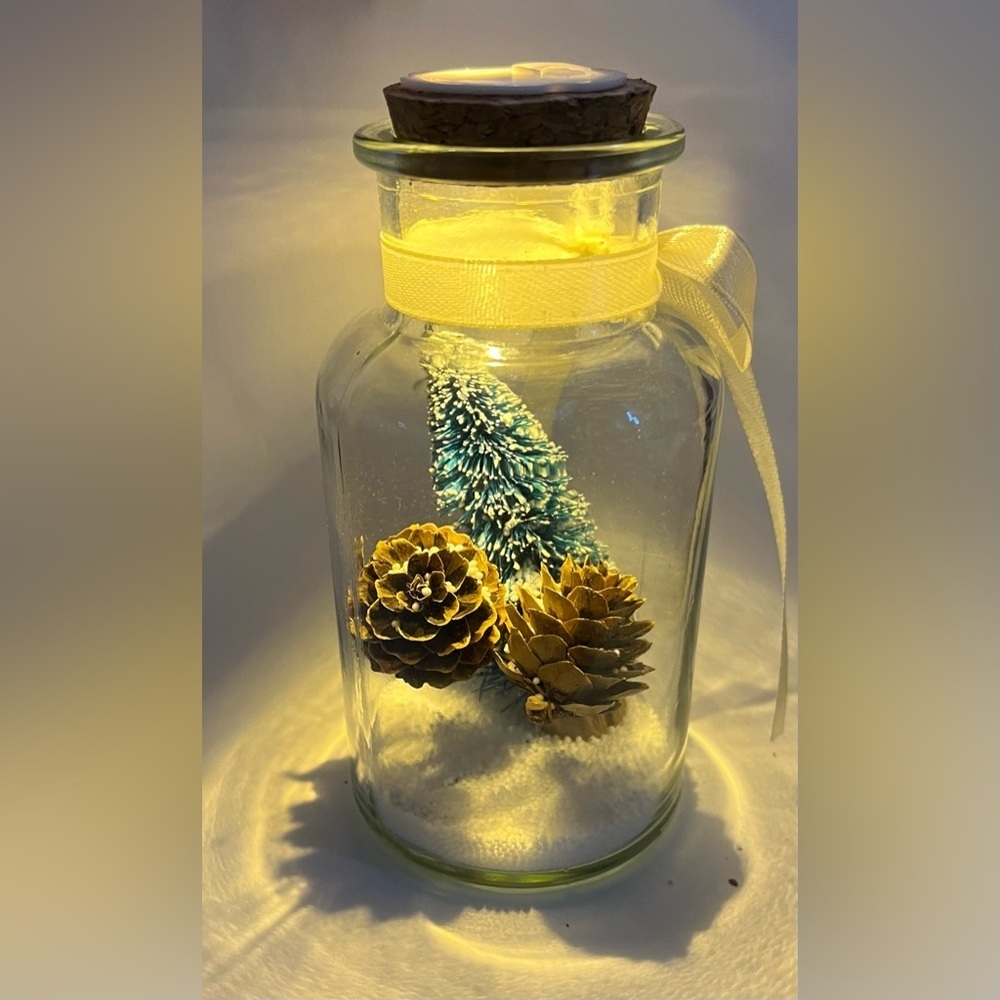 New in box glass mason jar with faux Christmas tree, snow, & pinecones
